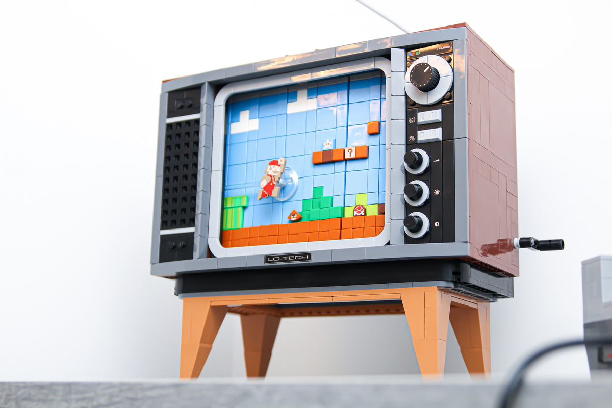 TV set assembled from building blocks with a scene from a computer game.